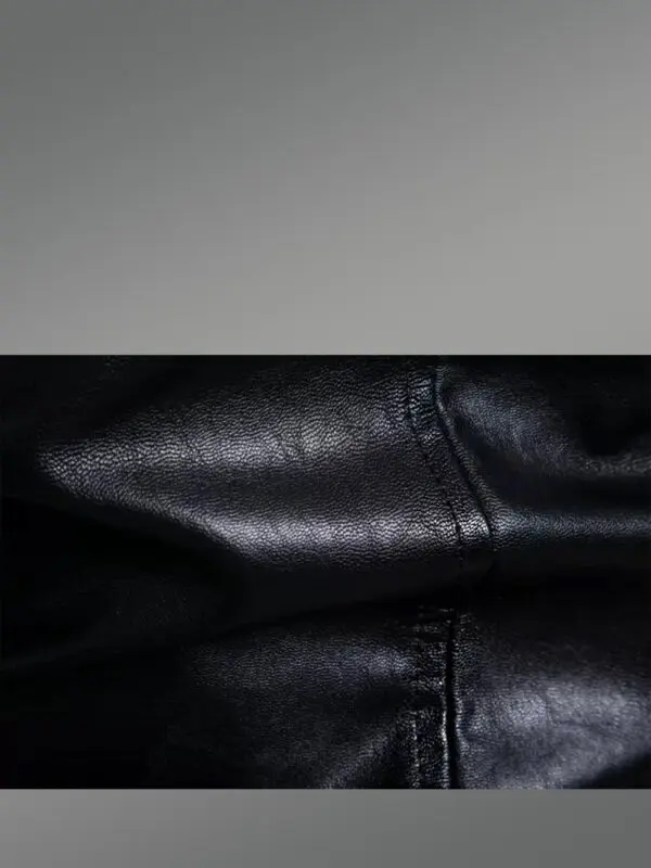 Leather Biker Jacket with Quilt Details on Sleeves Exudes Rugged Charm - Image 12